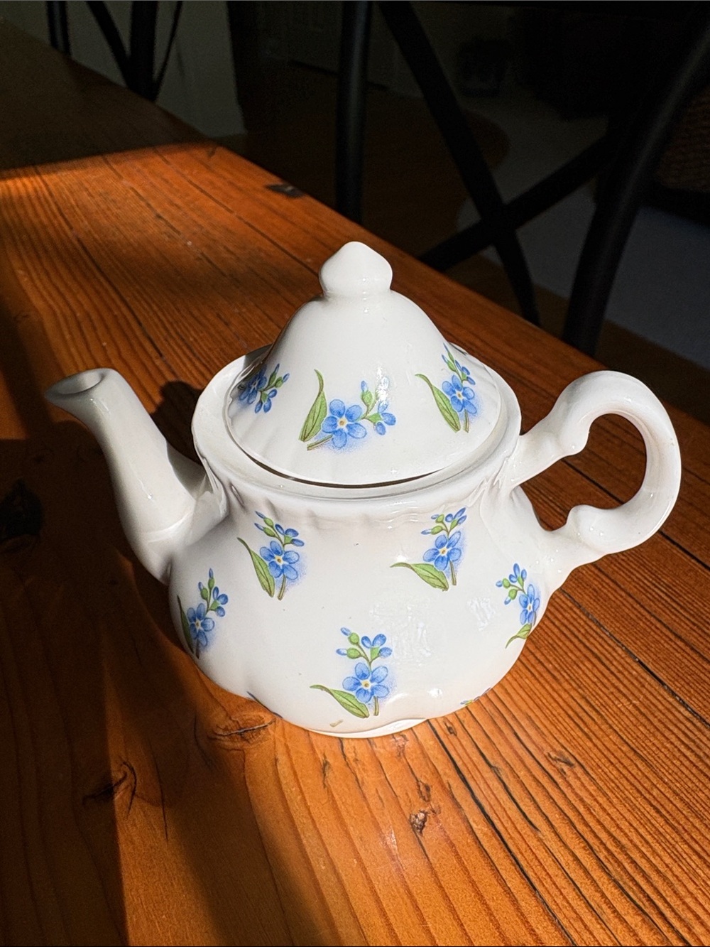 White Ceramic Teapot with Blue Floral Motif